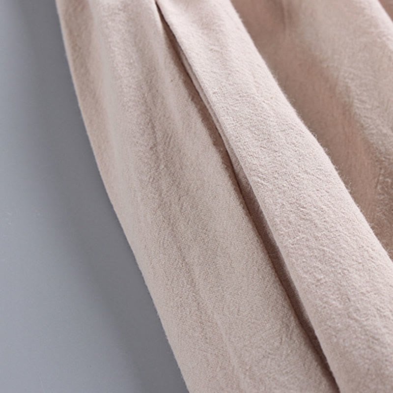 Close-up fabric texture of cotton Tang suit material – woven natural beige fabric detail