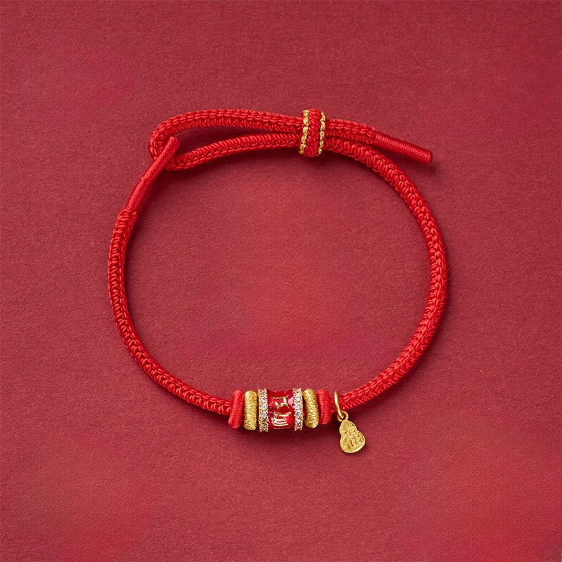 Om Mani Padme Hum copper red string bracelet with mantra beads flat lay on dark red background
