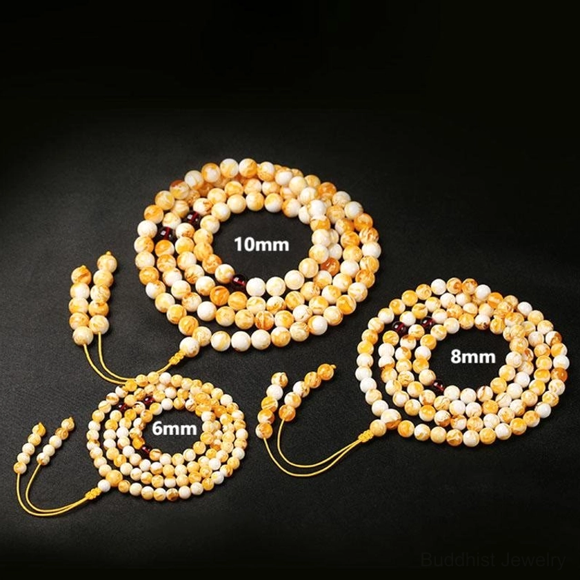 Buddhist 108 bead amber mala necklace product showcase yellow tassel spiritual prayer beads