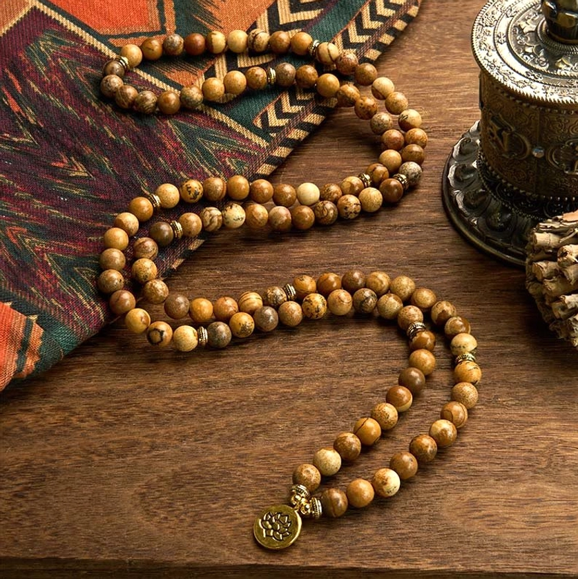 Buddhist prayer mala 108 beads picture jasper natural stone with gold lotus pendant close-up