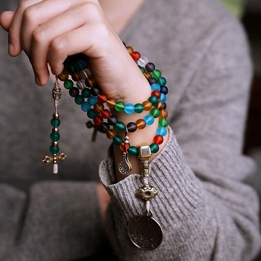 108 Buddhist prayer mala beads in Liuli glass with Bagua charm, product display showing bead quality and color range