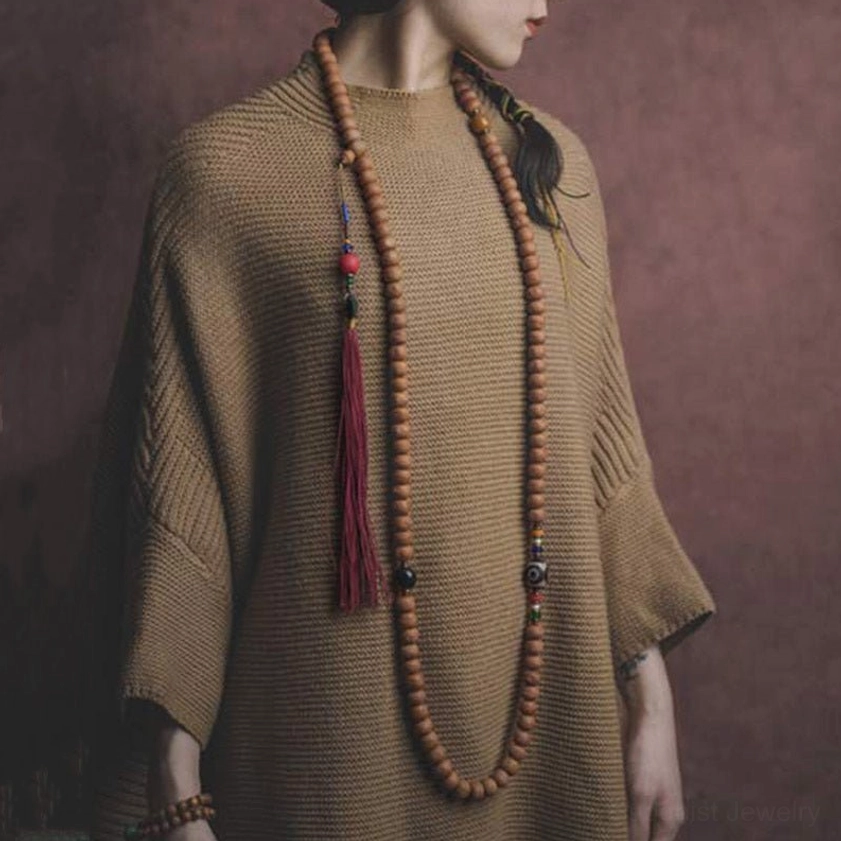 108 mala prayer necklace worn as long strand with tan sweater, double-strand meditation beads styling
