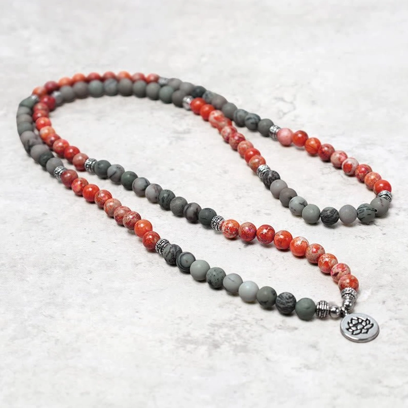 Long 108 bead mala strand with two-tone jasper stones and silver lotus charm