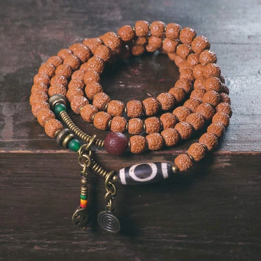 108 Rudraksha Bodhi Mala Bracelet with Nine-Eye Dzi Bead Amulet - Full Flat Lay Display