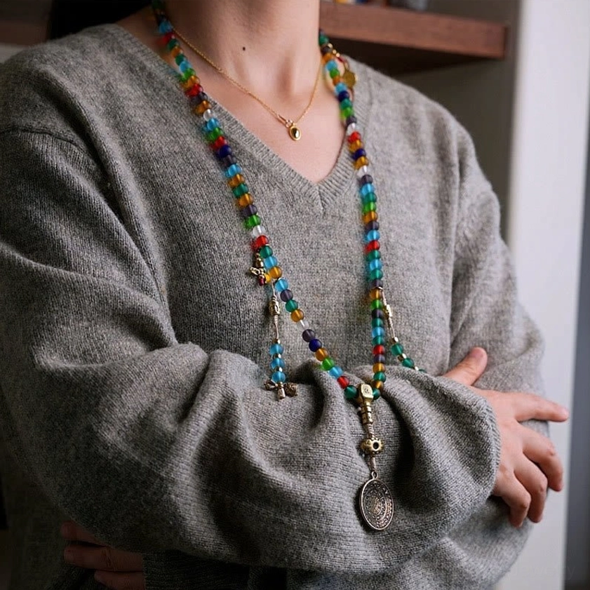 108 sacred mala beads in premium Liuli glass showing frosted texture and luminous quality, spiritual meditation jewelry