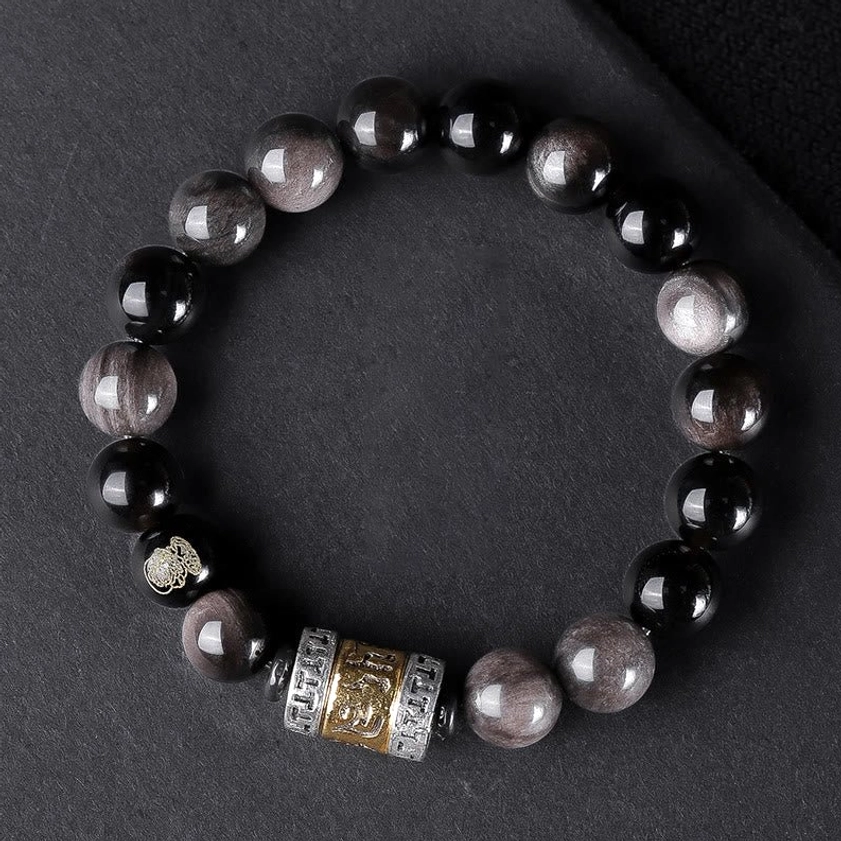 Premium 10mm Silver Sheen Obsidian Buddhist bracelet featuring Om Mani Padme Hum engraved charm for protection and spiritual clarity