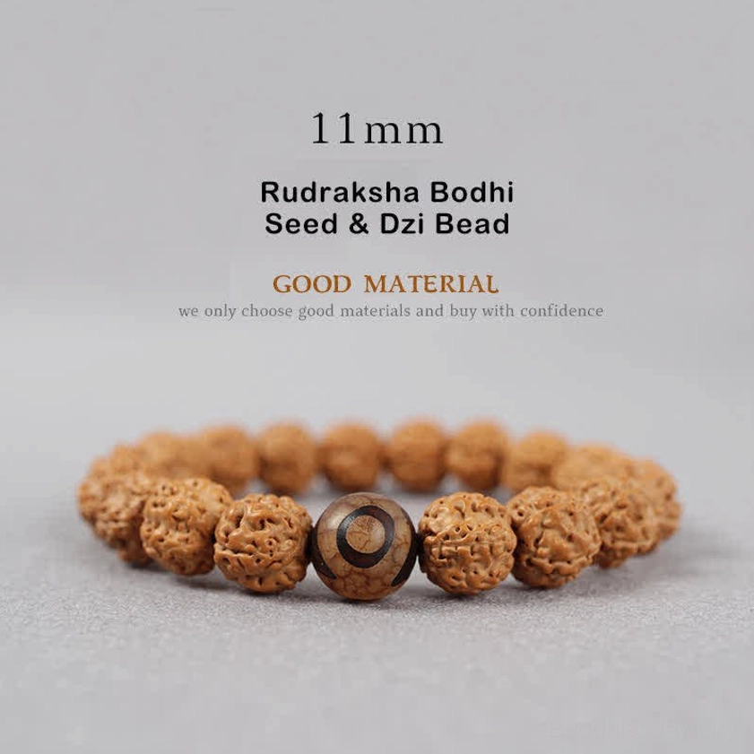 11mm Rudraksha Bodhi Seed and Dzi Bead bracelet large size showing textured brown rudraksha with mystical patterned dzi bead