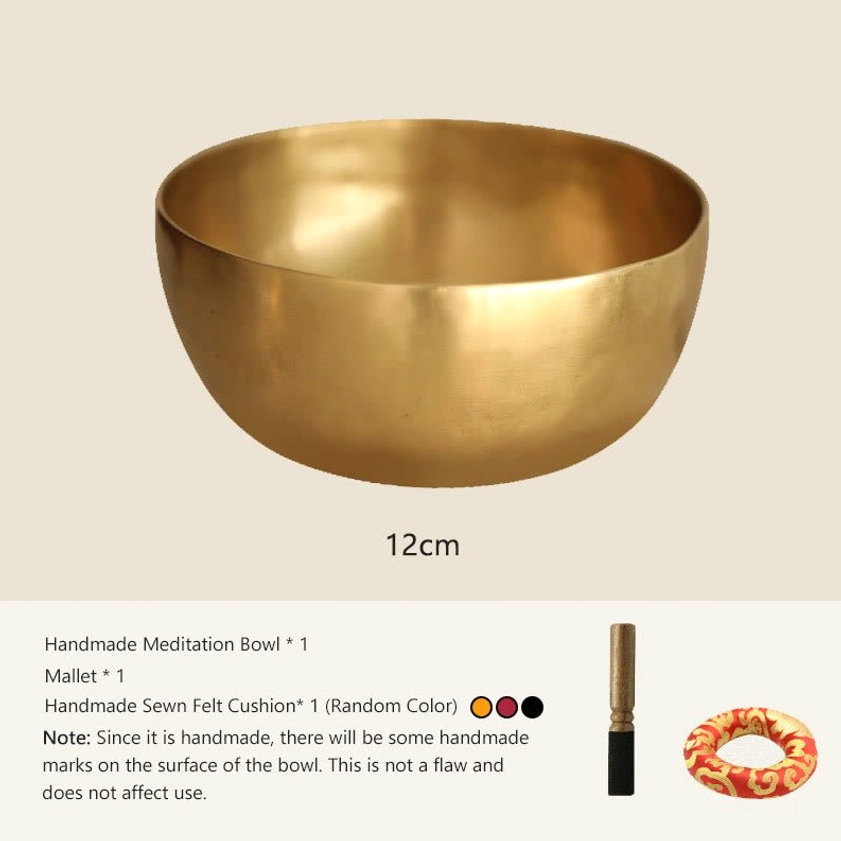 12cm handmade brass singing bowl with accessories on neutral background