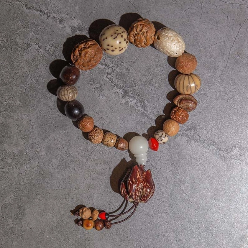 18 beads bodhi seed wrist mala bracelet with white spacer bead and lotus wooden tassel pendant for daily meditation