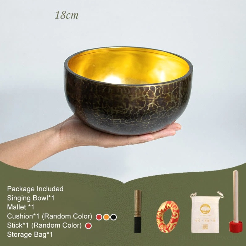 18cm healing singing bowl with uniform hammer-crackle texture displayed overhead with included striking tools