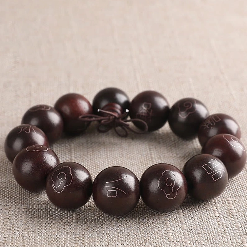 18mm red sandalwood Buddhist bracelet with 925 sterling silver sacred symbols perfect for daily spiritual wear