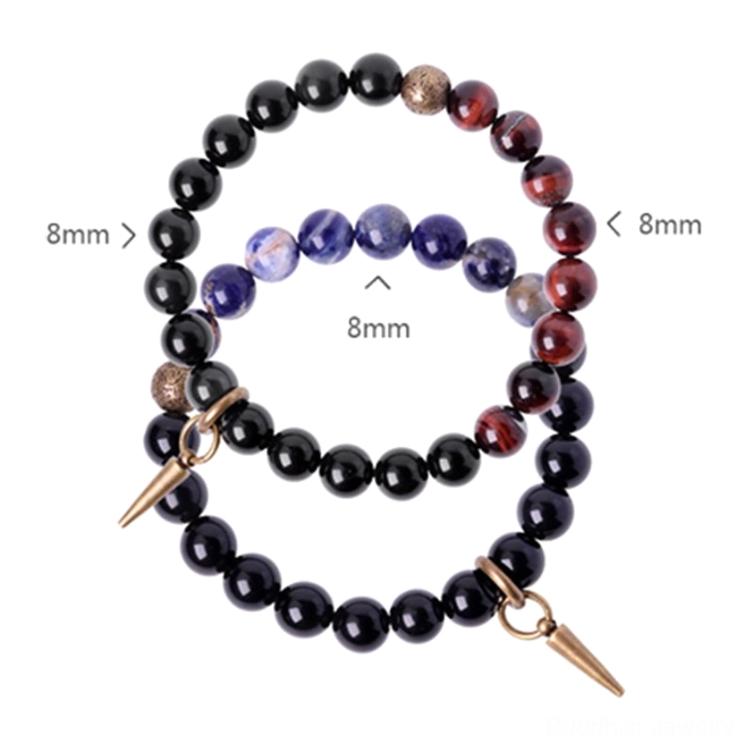 Matching 8mm stone bead couples bracelets with black obsidian and red stones on light background
