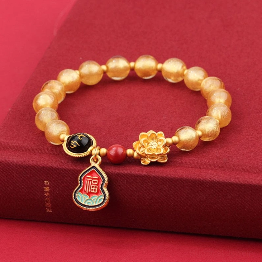 8mm gold Liuli glass Buddhist bracelet with Om Mani Padme Hum mantra charm and prosperity symbols