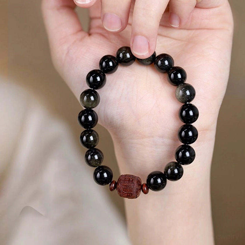 8mm rainbow obsidian protection bracelet with carved Sanskrit symbols and golden sheen for grounding and inner peace