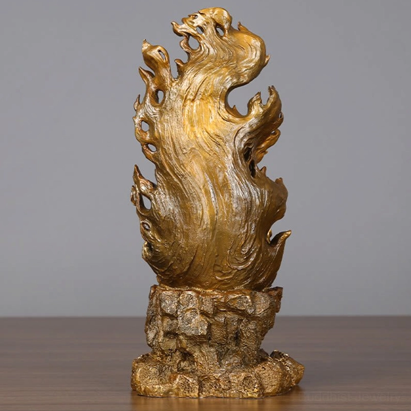 Rear view of Acalanatha Buddha bronze statue displaying intricate carved flame halo and stone-like base