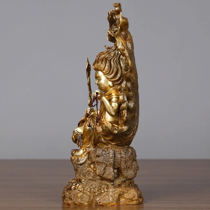 Acalanatha Buddha copper statue displaying inner strength symbolism through fierce expression and flame design
