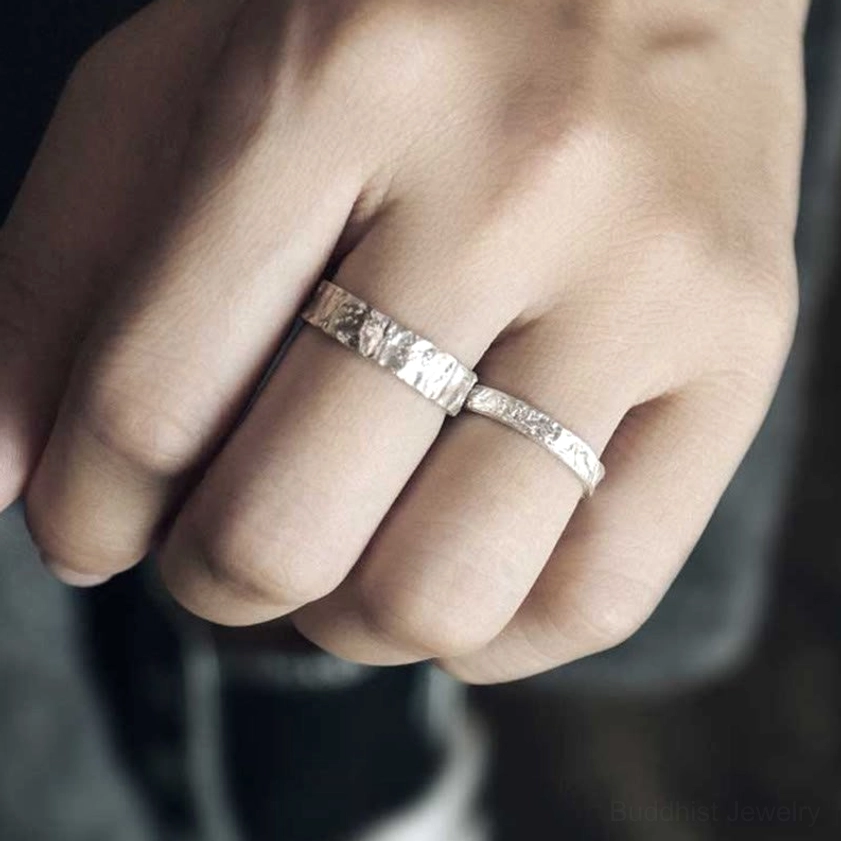 Open band adjustable sterling silver rings with embossed hammered surface finish
