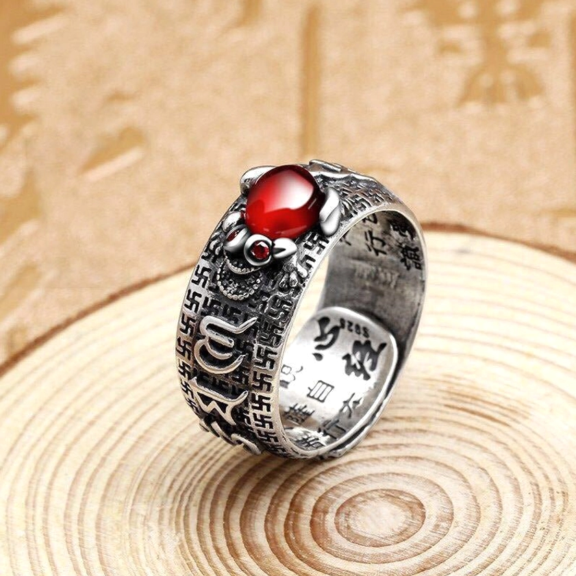 Adjustable Pixiu ring with aged silver metal, red cabochon stone, complete inner scripture engraving detail