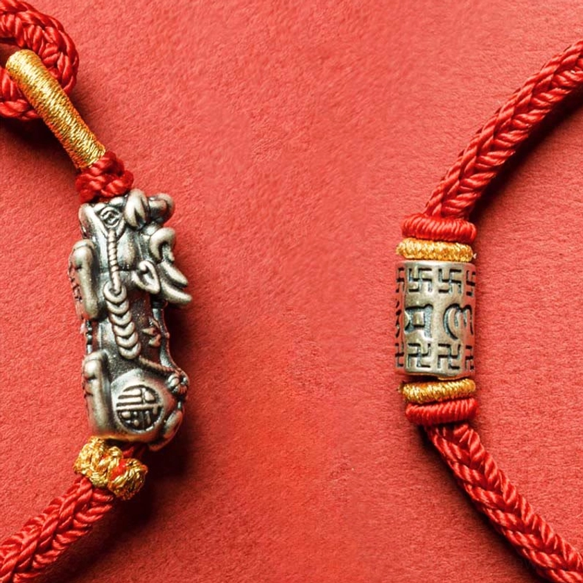 Adjustable red string bracelet with Om Mani Padme Hum silver center and knot closure design
