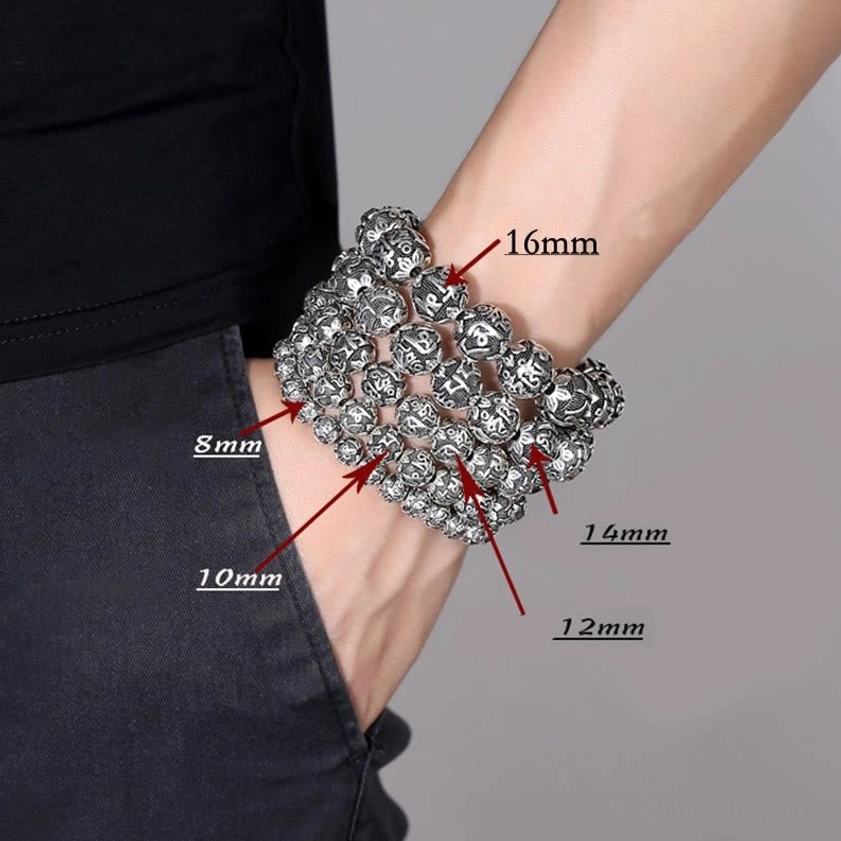 Adjustable tassel-closure mala bracelet with black woven cord, engraved silver mantra beads, and vintage silver finish