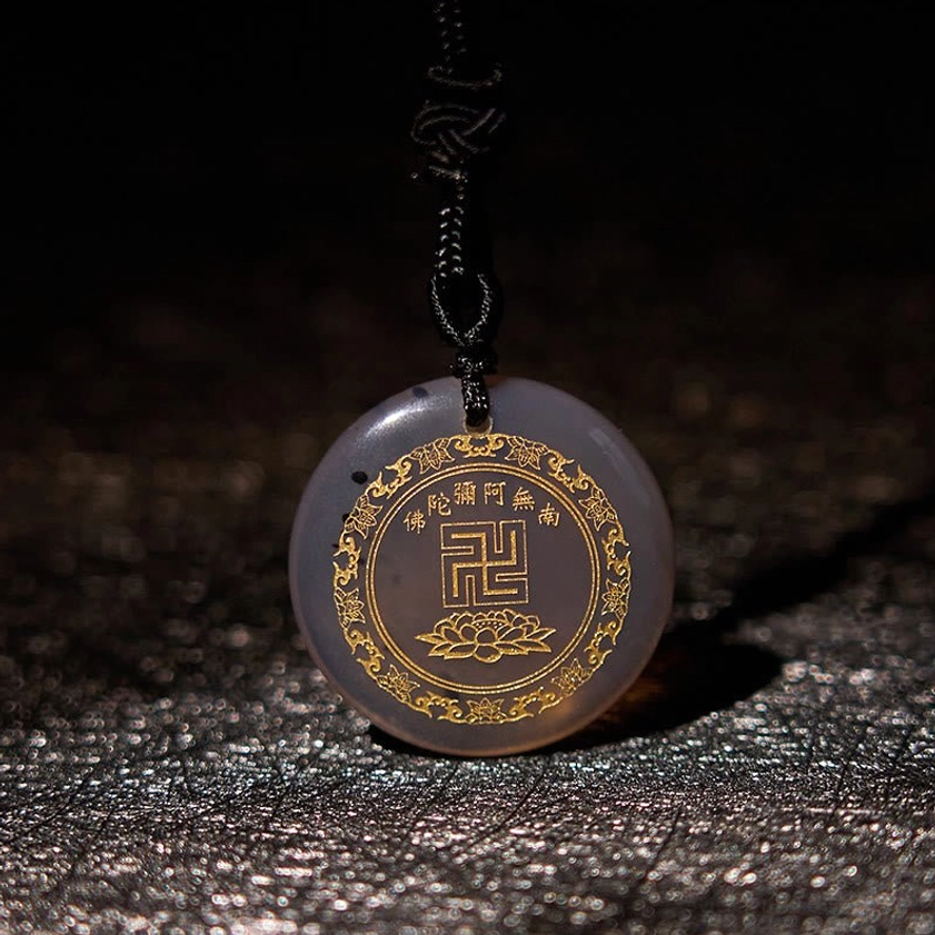 Agate Buddhist pendant handcrafted with swastika symbol for spiritual balance and harmony