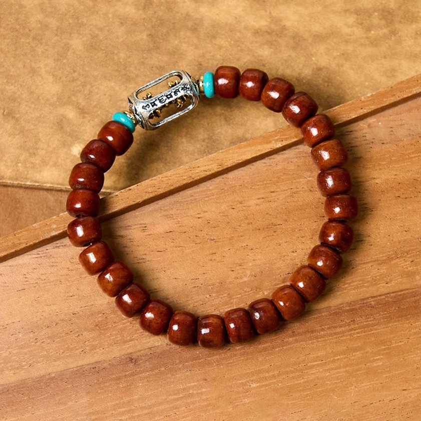 Alternative Dzi bone bead bracelet design featuring different bead arrangement and Tibetan silver guru bead configuration