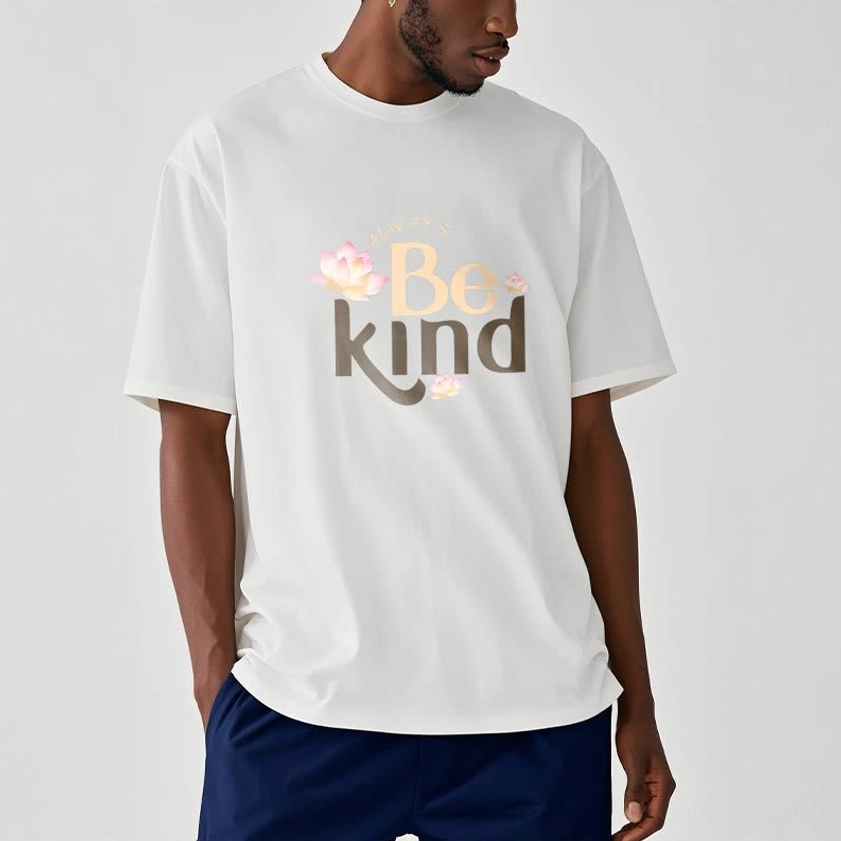 Male model wearing white Always Be Kind Buddhist T-Shirt with relaxed crew neck, studio background
