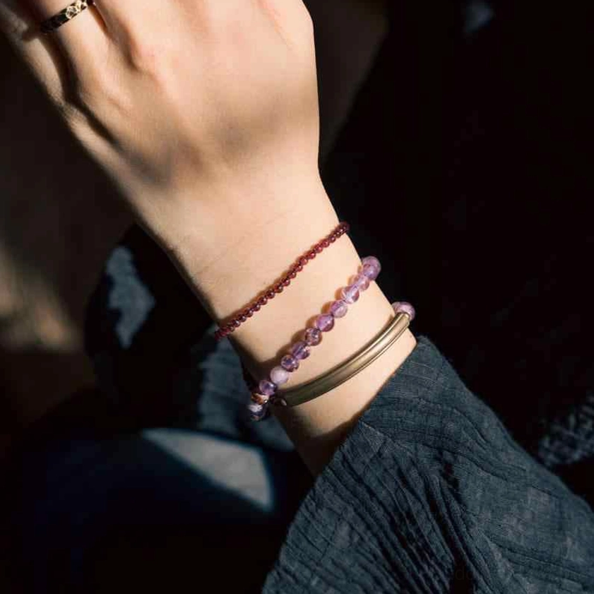 Natural amethyst and garnet beaded bracelet for protection and emotional balance, artisan-made with sacred gemstone energy