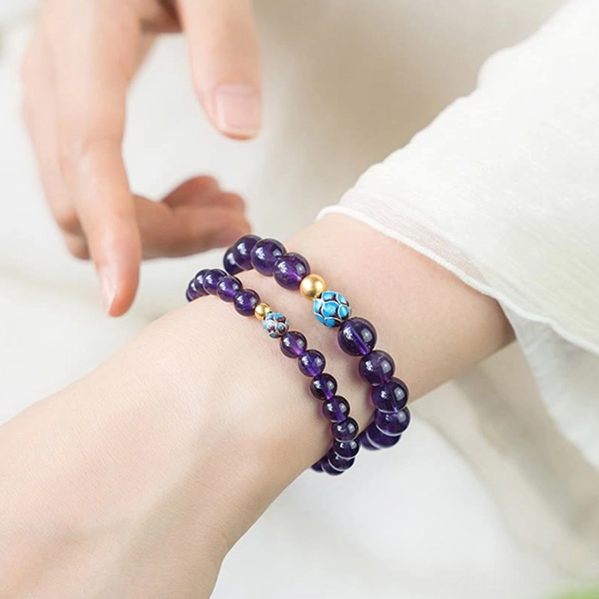 Amethyst lotus bracelet gift presentation showing spiritual healing jewelry for mindfulness and emotional balance
