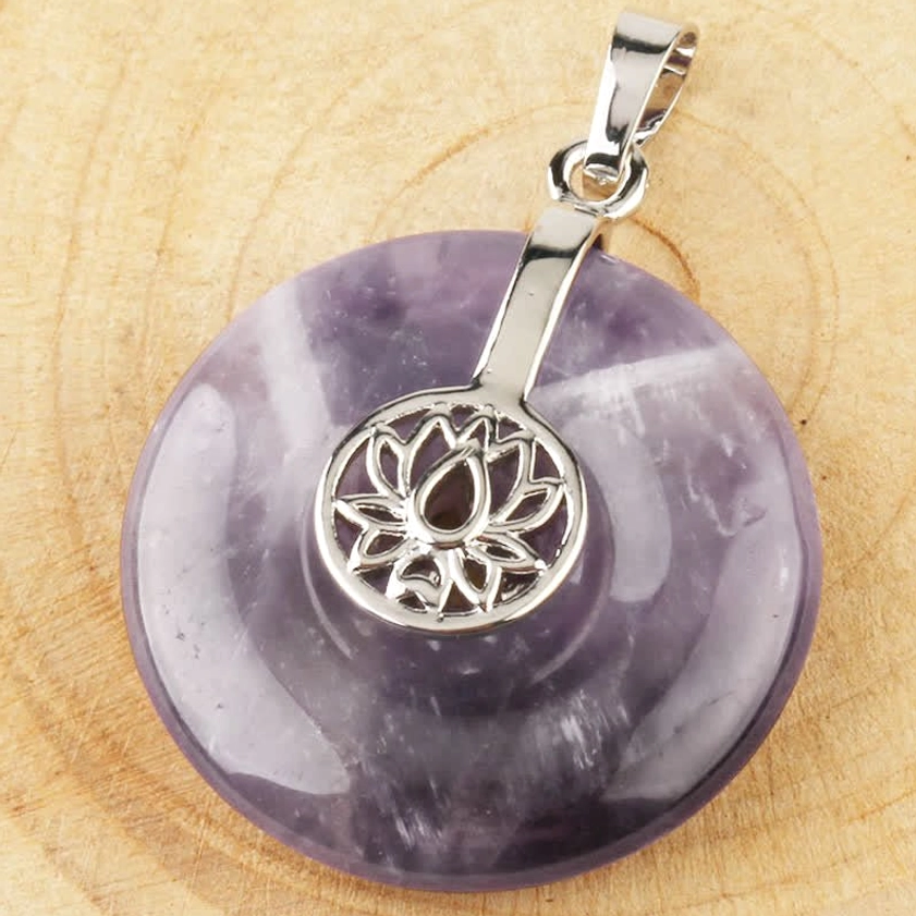 Amethyst lotus donut pendant necklace - overhead detail view with intricate hollow lotus charm