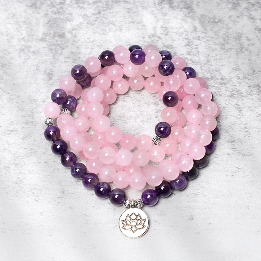 Dual-tone rose quartz and amethyst mala bracelet with lotus pendant - top view