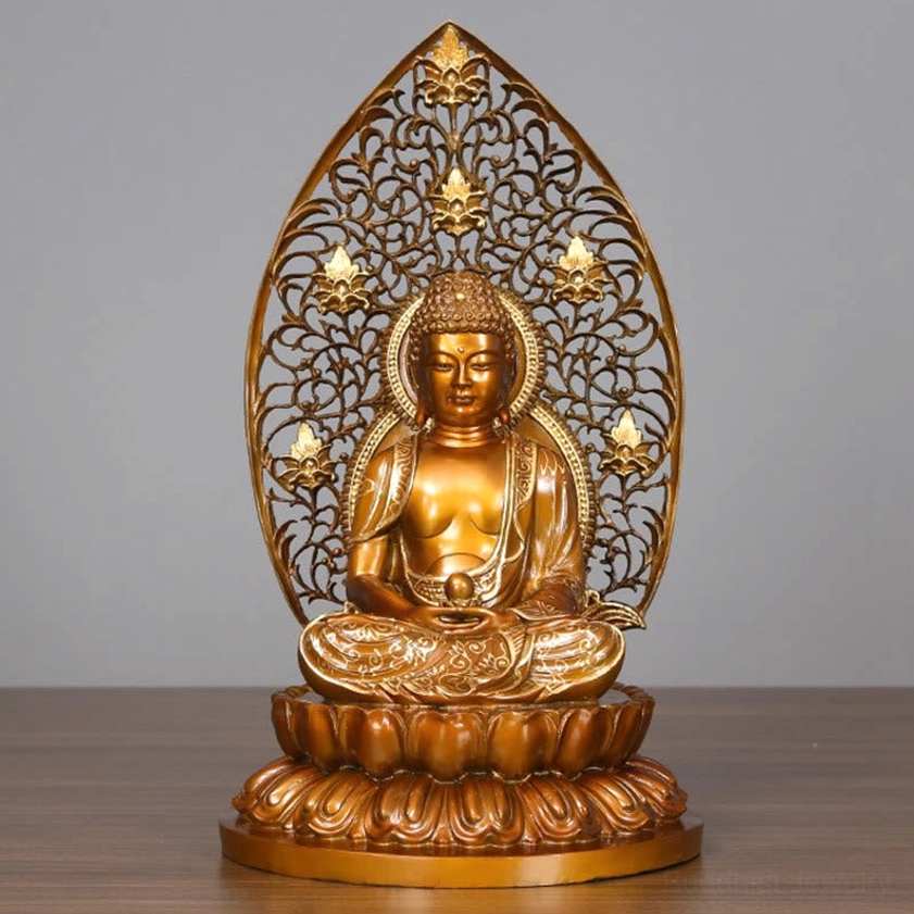 Amitabha Buddha handcrafted copper statue - Front central view with unique hand mudra and ornate hollowed backrest on gray surface
