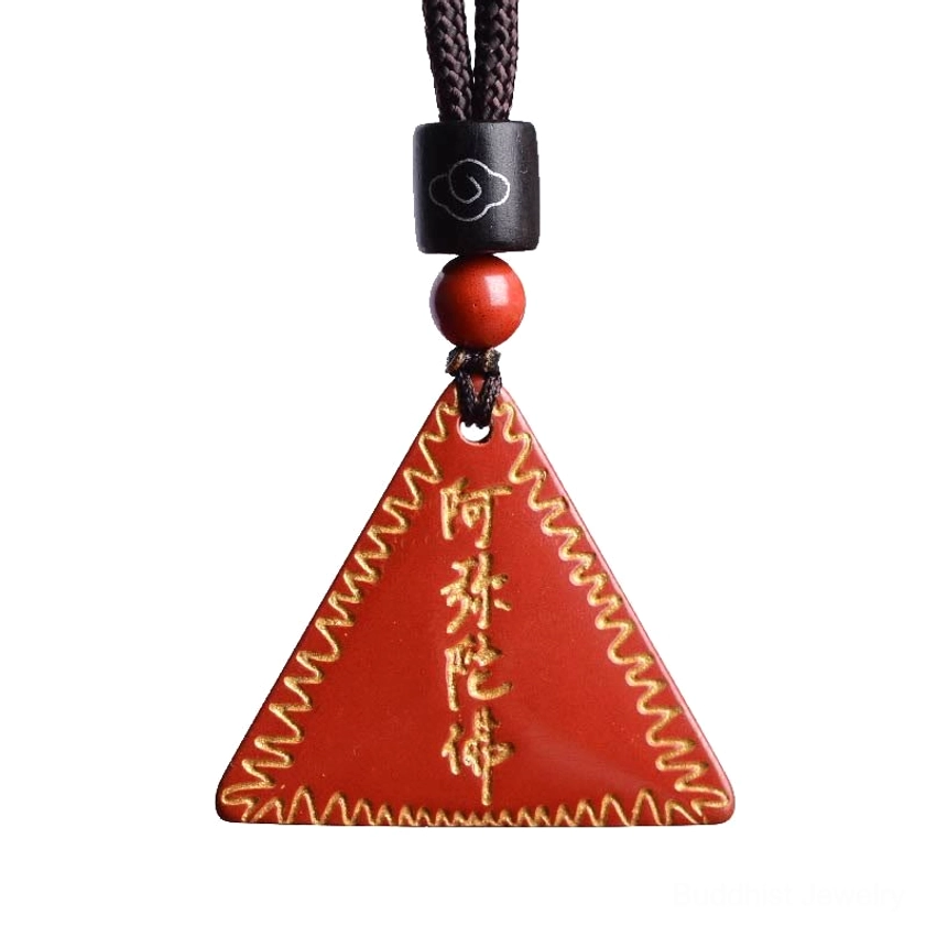 Cinnabar Amitabha Buddhist pendant necklace with black braided cord and decorative cloud-shaped bead on white background