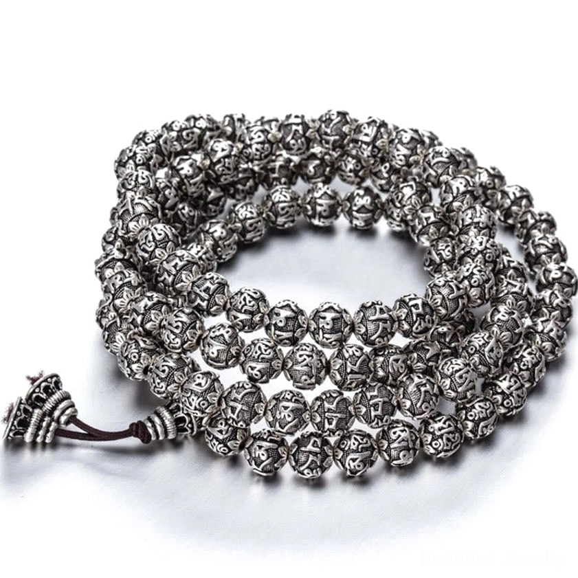 Antique silver finish mala bracelet with dark brown cord and carved mantra beads for daily spiritual practice