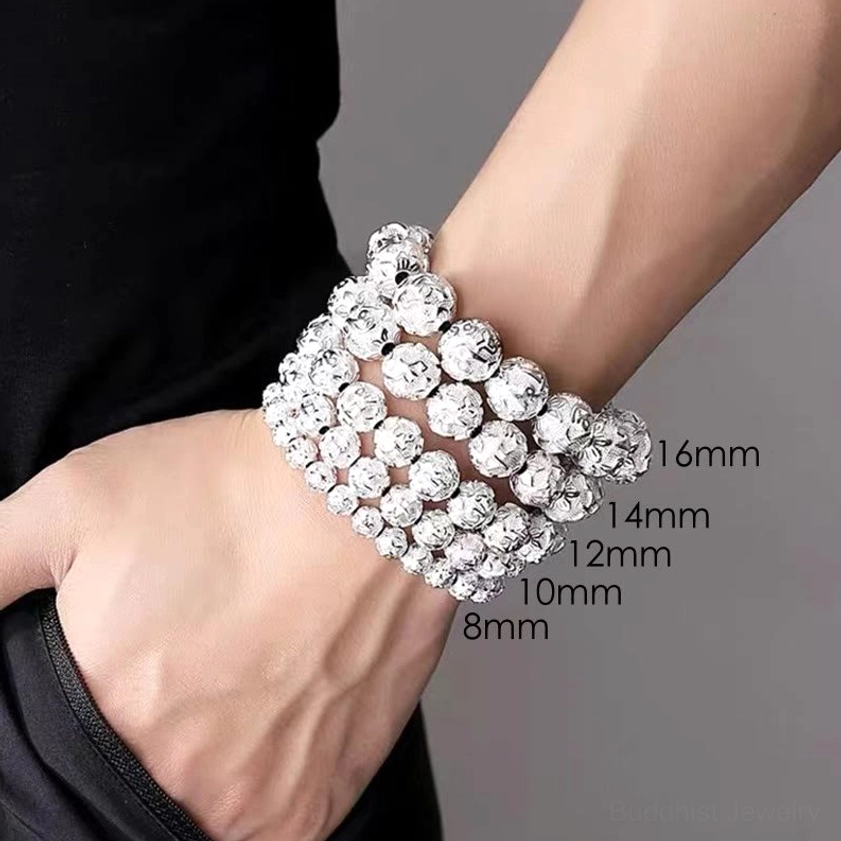 Antique silver mala bracelet with engraved mantra characters and guru bead for Buddhist meditation practice