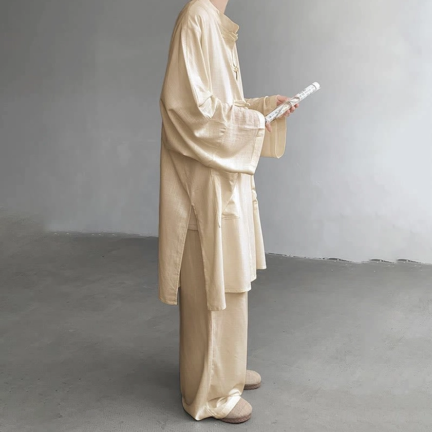 Apricot Buddhist cotton meditation set left side profile with draped fabric and wide-leg trousers detail