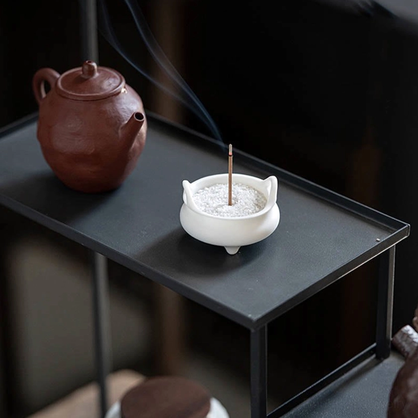 Artisan-crafted ceramic incense burner featuring Buddhist auspicious symbols for anxiety relief and spiritual wellness