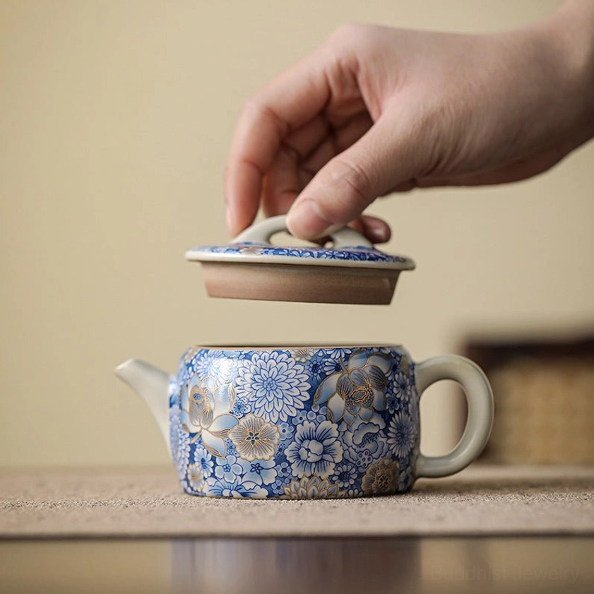 Artisan porcelain teacup for mindful tea ritual chrysanthemum longevity symbolism