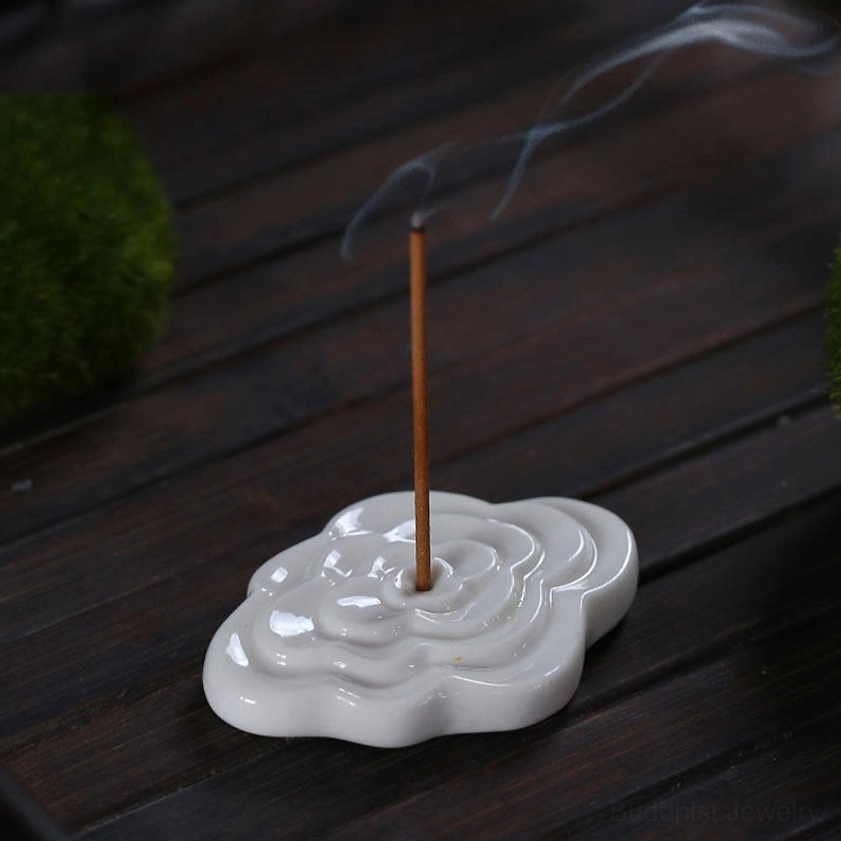Artisanal ceramic cloud incense burner showing natural material texture, handcrafted quality, embossed auspicious cloud design, and sustainable eco-friendly craftsmanship