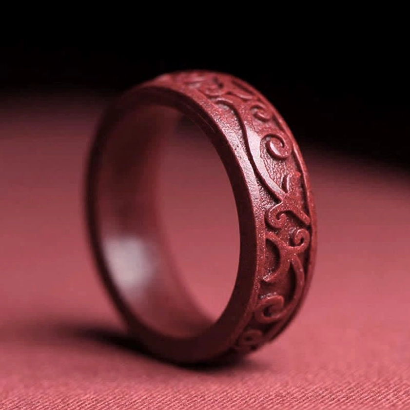 Auspicious clouds carved cinnabar blessing ring featuring traditional Buddhist cloud motifs symbolizing divine blessings and celestial fortune