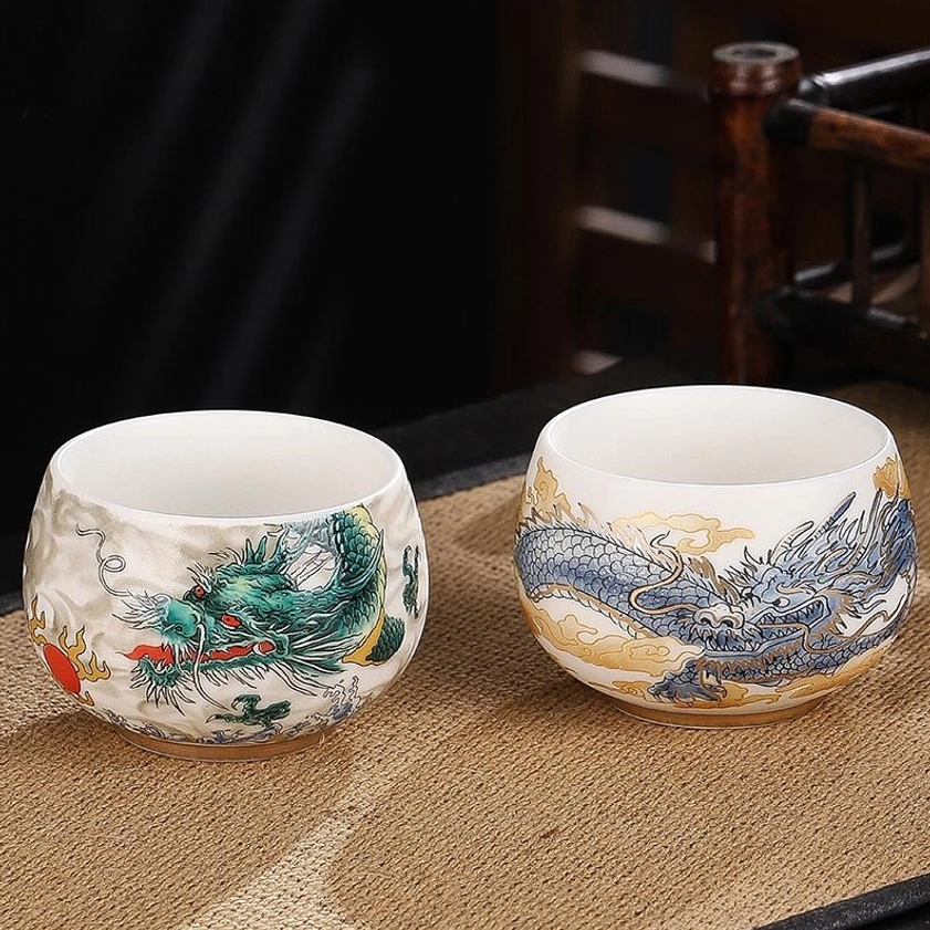 Handcrafted auspicious dragon ceramic gongfu tea cup with prosperity symbolism and detailed hand-painted artwork