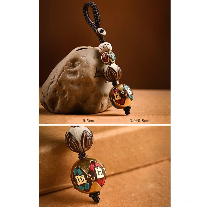 Auspicious Shankha Buddhist keychain charm with sacred conch symbol and handmade Bodhi seed details