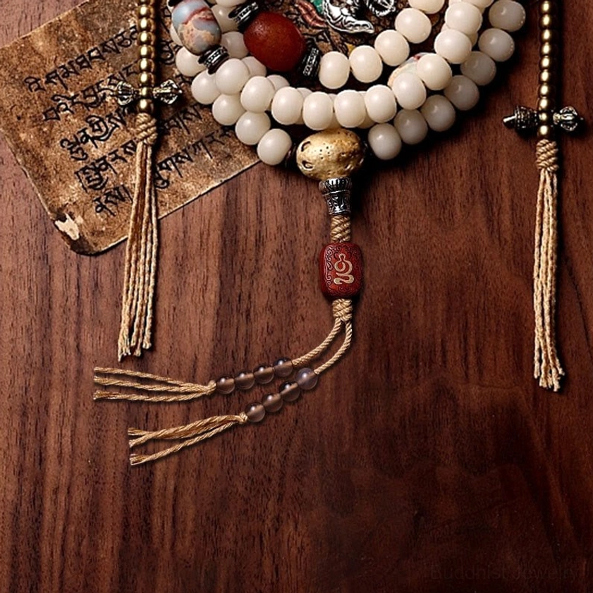 Authentic Buddhist 108 mala beads display with natural stone and seed material variety, complete spiritual tool