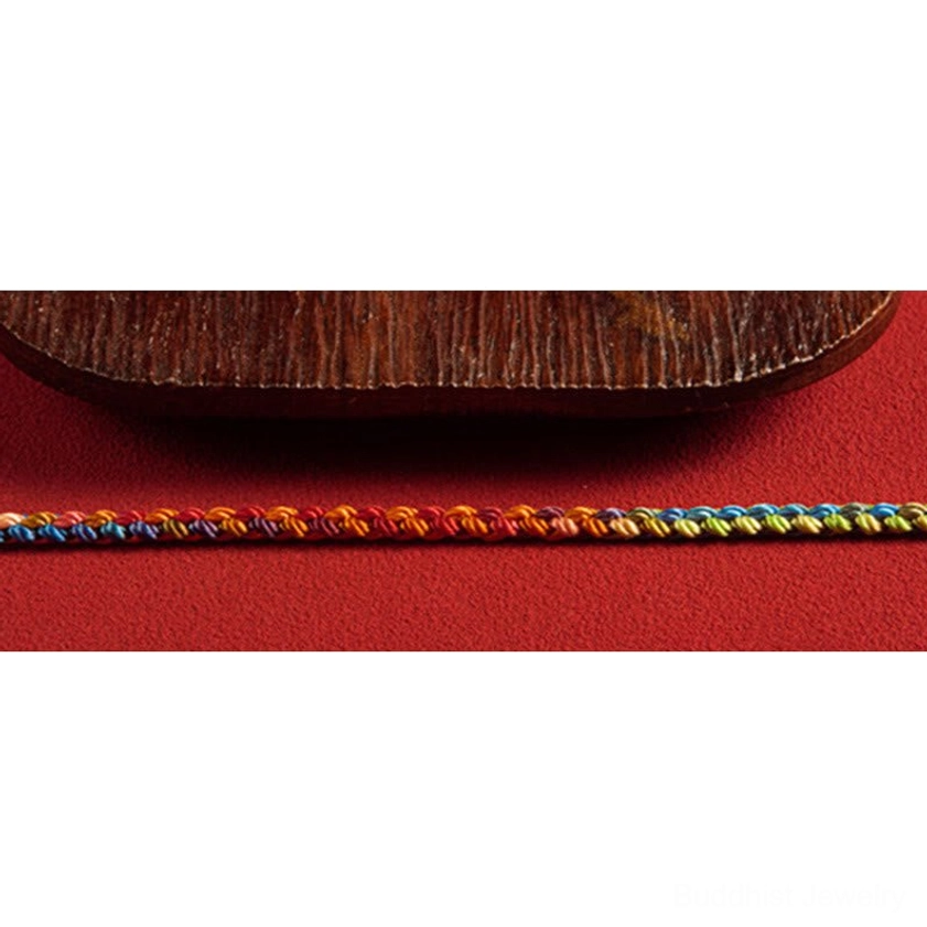 Authentic Buddhist bracelet with multicolored twisted rope, perfect for spiritual seekers and meditation practitioners