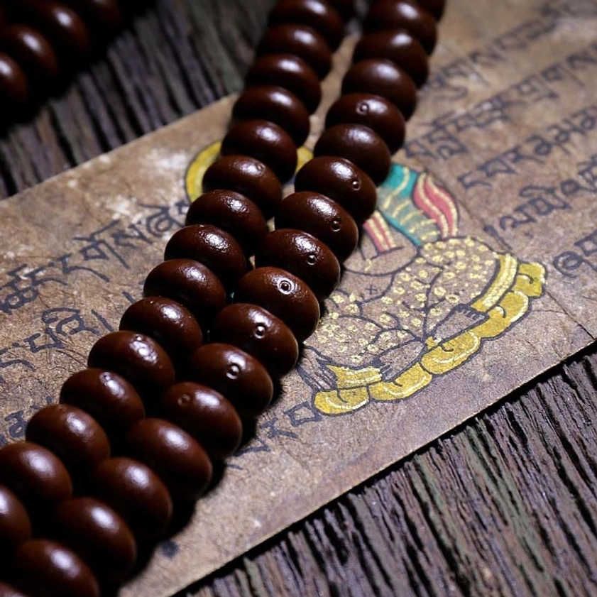 Authentic Buddhist prayer mala with purple bodhi beads and spiritual crystal accents