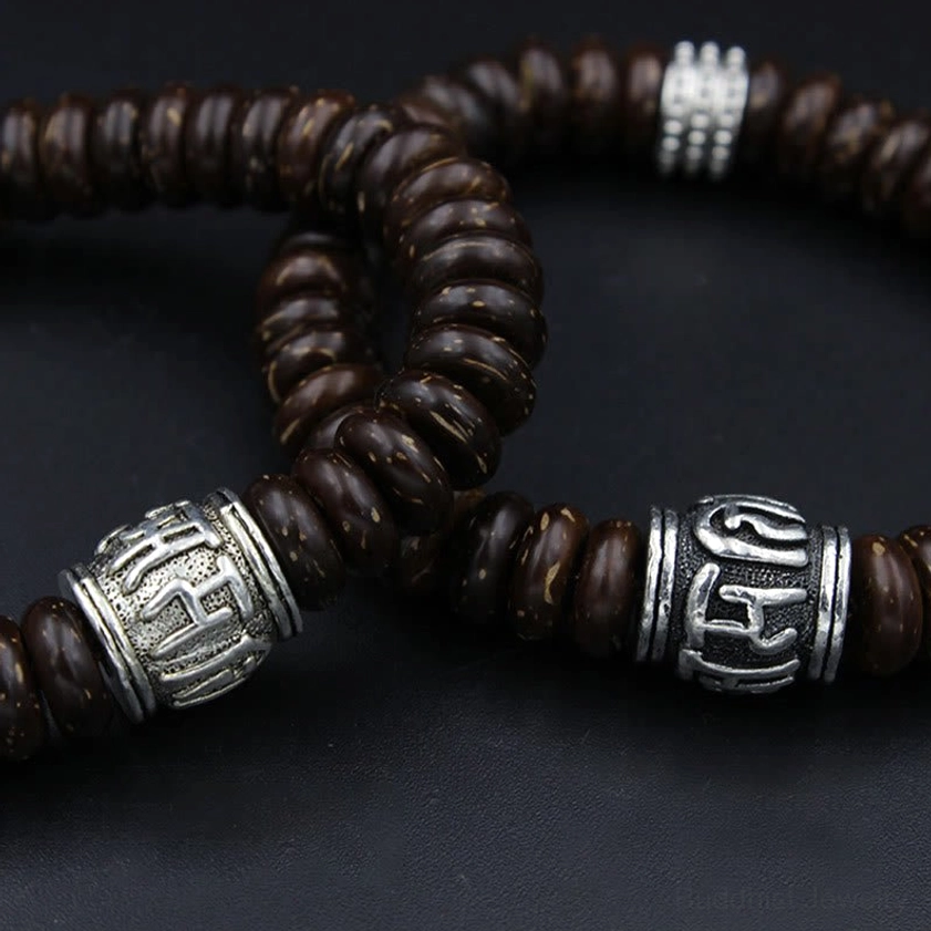 Authentic handmade Buddhist bracelet with coconut shell and sacred six syllables mantra for daily spiritual practice