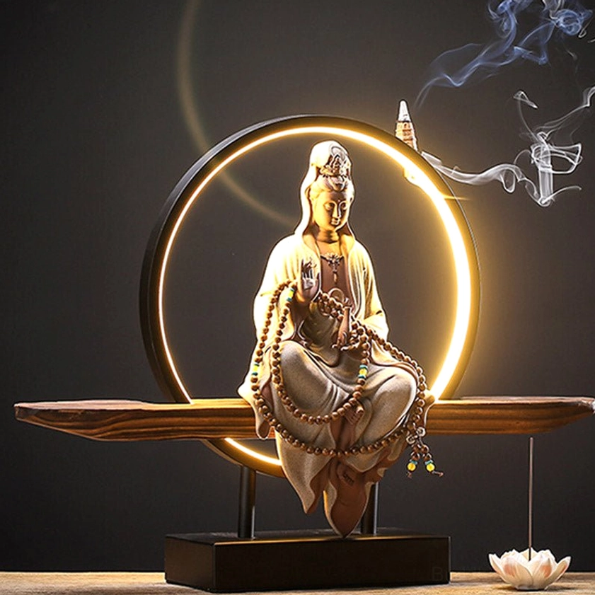 Buddhist Avalokitesvara backflow incense burner showing waterfall smoke cascade and LED ambient lighting
