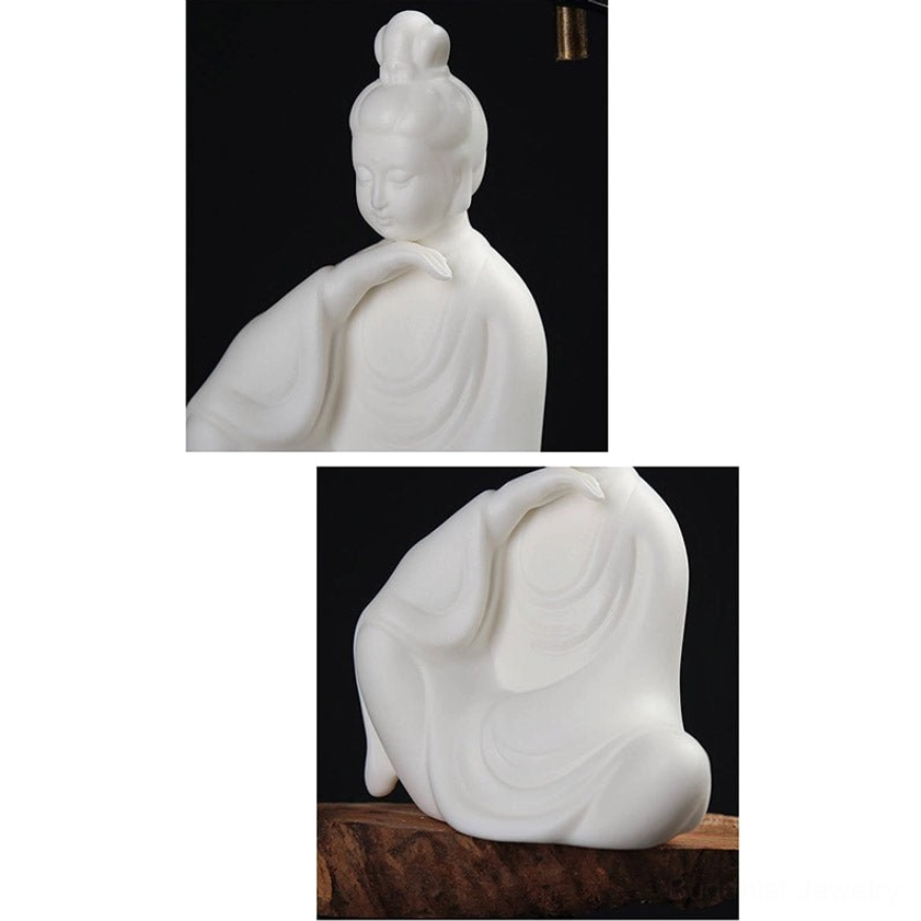 Avalokitesvara sacred bodhisattva ceramic statue front view showing blessing hands, compassionate expression, artisan craftsmanship