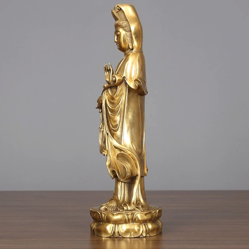 Left three-quarter side view of handcrafted golden Avalokitesvara statue with draped robes and ornate lotus pedestal