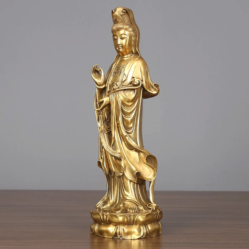 Handcrafted Avalokitesvara Buddha statue three-quarter front angle, showing ornate crown and traditional robes with lotus base